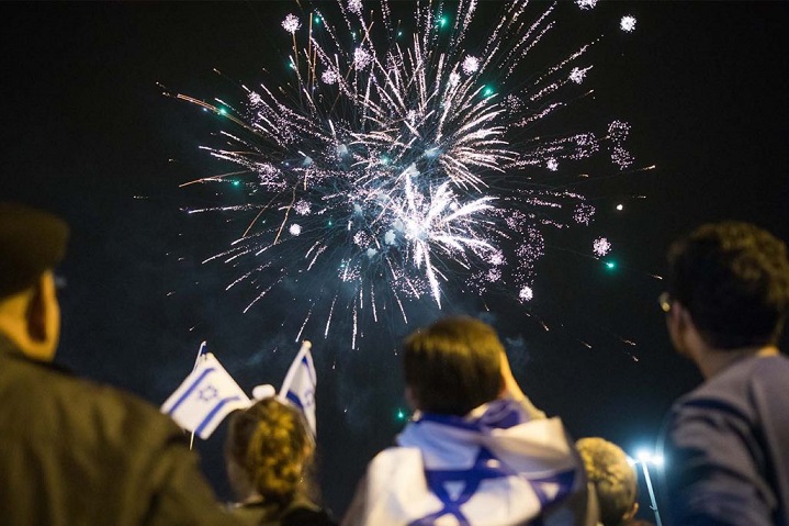people watching fireworks in israel